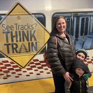 Lizzie and her sons at the T station