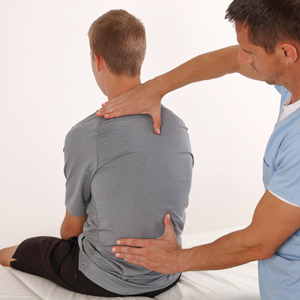 two men adjusting posture