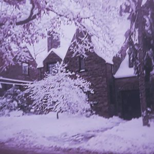 old photo of home in snow