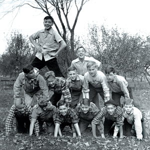 black and white photo of teen boys in pyramid