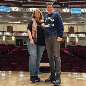 woman and son at theatre