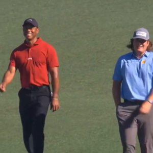 two golfers walking
