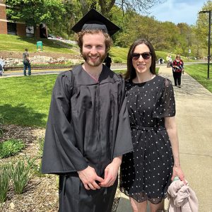 woman and man with graduation gown