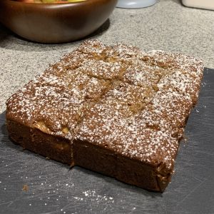 sliced apple cake on cutting board
