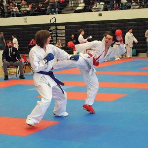 two teen boys in a karate match
