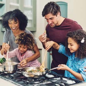 family of four cooking