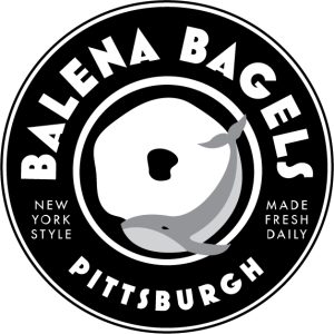 black and white logo for balena bagels with a whale on it