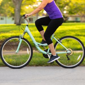 Woman cycling around the neighborhood