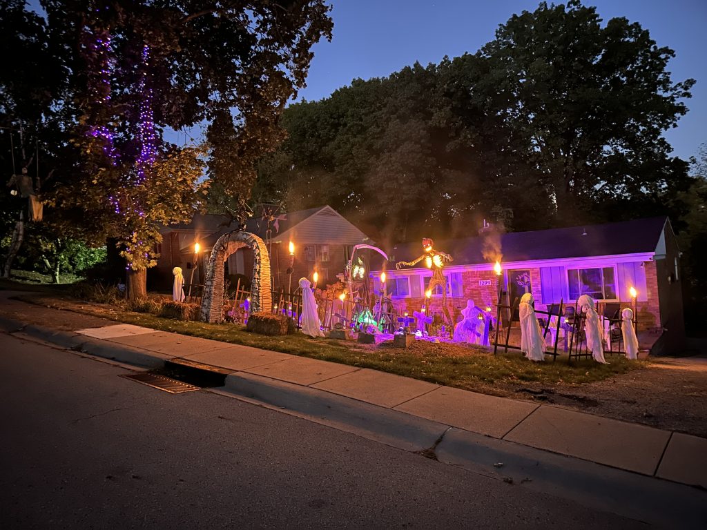 Ranch home with Halloween decorations. Skeletons and ghosts and fire
