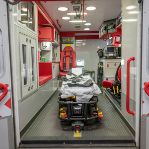 inside of ambulance with medical equipment and stretcher