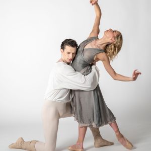 a man and a woman ballet dancing elegantly