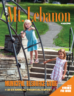 cover of Mt. Lebanon Magazine with two girls on playground equipment