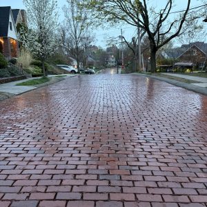 red brick street, at dusk in rain