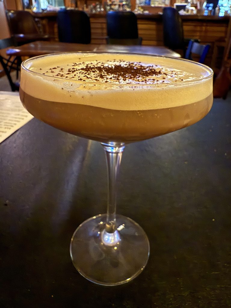 espresso martini on black table