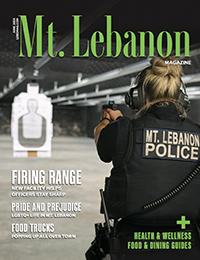 mt. lebanon magazine cover with a police officer training at a firing range