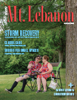 cover of Mt. Lebanon Magazine with older couple in red white and blue clothing sitting under a tree looking at a phone