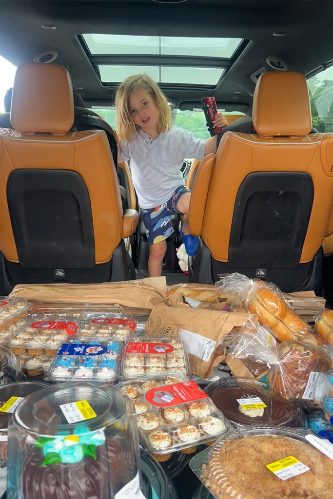 Casey, surrounded by baked goods.