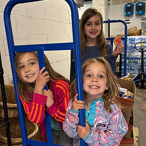 three girls in a grocery store