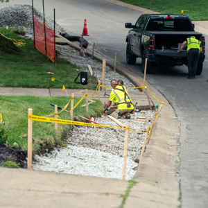 construction workers making a sidewalk