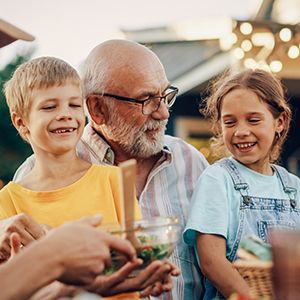family eating meal outside