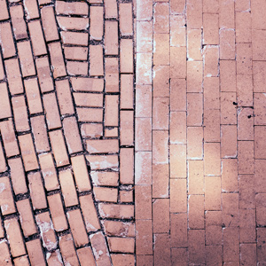an above view of a brick road where they recently replaced some bricks
