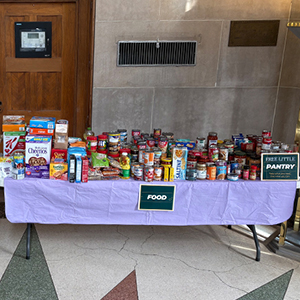 tables of food and personal hygiene items in a lobby