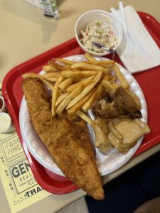 fried fish, french fries, coleslaw and pierogies 