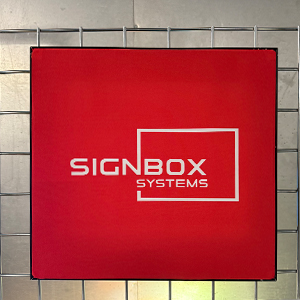 A large red square with the words Signbox Systems in bold white letters and a small rectangle with a white border in the center.