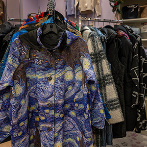coats in a clothing store on a rack